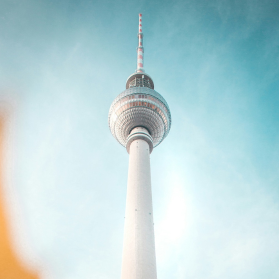 Berlin TV Tower against a blue sky, iconic landmark and popular tourist attraction in Berlin
